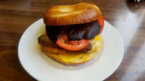 Bagel with vegan cheese, hashbrowns, vegan sausage, mushrooms and tomato at Blended Brew in Inverness