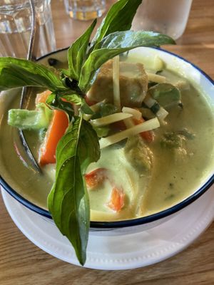Avocado, curry with rice and fried tofu  at Laem Buri in Seattle