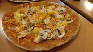 Vegan pizza with almond cheese. 12€ at Trigo Vermelho in Aljezur