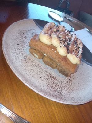 Vegetarian tiramisu dessert at Kitty Hawk Rooftop Bar and Restaurant in London