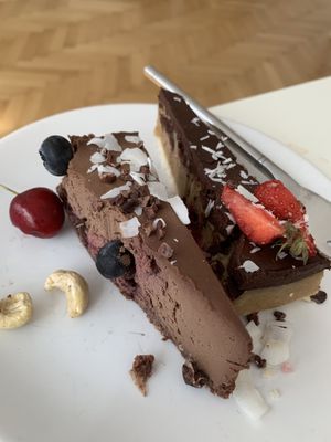 Yummy chocolate cherry and rum cheesecakes. 😍 at MyRaw Cafe in Prague