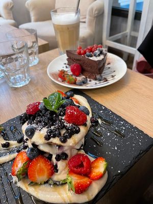 Pancakes + raw cake + ice latte at MyRaw Cafe in Prague