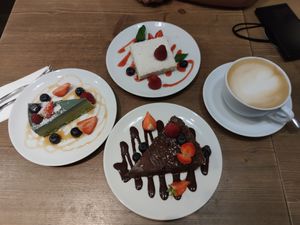 Raffaello, chocolate and green cake. at MyRaw Cafe in Prague