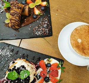 Breakfast - chocolate crepes, pancakes and chai latte at MyRaw Cafe in Prague