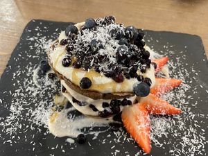 Pancakes with cashew cream and blueberries  #Veganuary at MyRaw Cafe in Prague