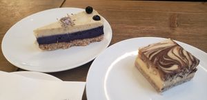 Blueberry/lavender cheesecake, milky way cake at MyRaw Cafe in Prague