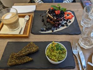 Blueberry pancakes and scrambled 'egg' at MyRaw Cafe in Prague