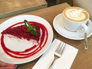 Nice Raffaelo cake with almond cappuccino   at MyRaw Cafe in Prague