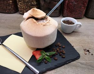 Smoothie in Young Coconut. Fruits or chocolate with coffee  at MyRaw Cafe in Prague