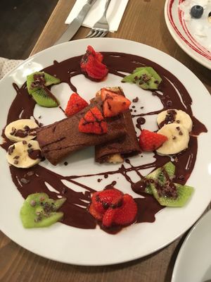 Crepes with chocolate cream and fruits  at MyRaw Cafe in Prague