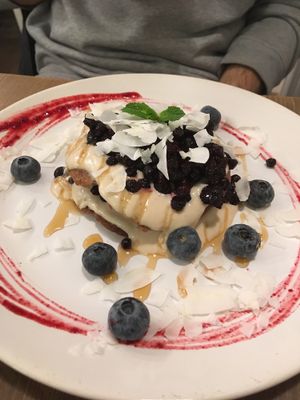 Pancakes with cashew cream and blueberries at MyRaw Cafe in Prague