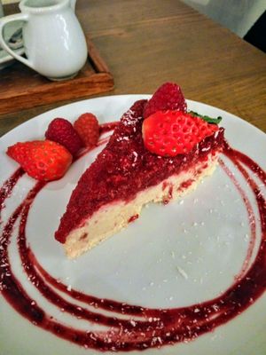 Raw Raffaello cake with strawberries and raspberries  at MyRaw Cafe in Prague
