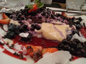 Pancakes with cashew cream and blueberries at MyRaw Cafe in Prague