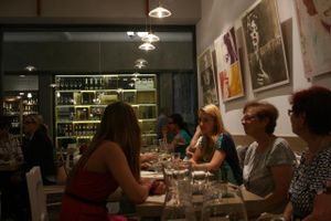 Interior with a nice art on the wall at MyRaw Cafe in Prague