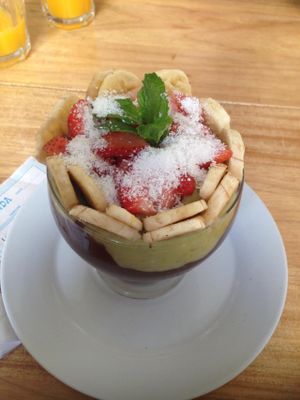 One of the options of desserts: fruit bowl with avocado cream and cocoa. at Barao Natural - Baraozinho in Sao Paulo
