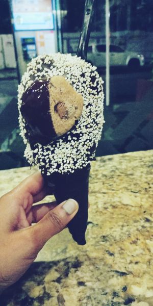 I had 2 flavours (1- Maori potato, parsley, citrus with kumara and raisins; and 2- coconut choc chip) in a dark chocolate deluxe cone. at Giapo in Auckland