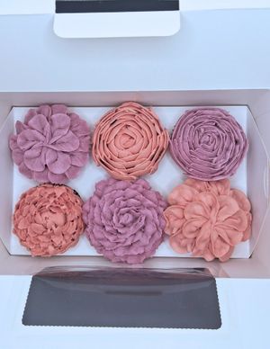 custom vegan vanilla cupcakes with plant-based pink and purple food coloring. Floral design at Plant Pastry in Jacksonville