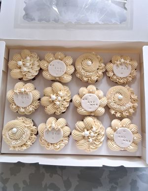 Vegan vanilla bridal/engagement cupcakes with custom fondant toppers and edible vegan pearls. at Plant Pastry in Jacksonville