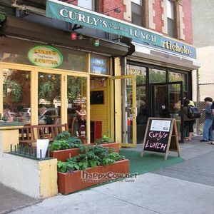 Outside Curly's Vegetarian Lunch. Next door is a pizza place that people rave about, but Curly's is all vegetarian, and it's good old comfort food. at Curly's Vegetarian Lunch in New York City