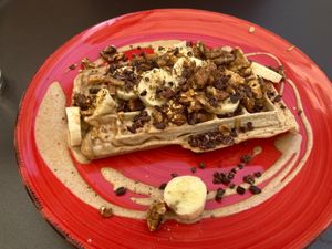 Karamelised nuts & peanut butter dinkel waffel  at Moyome in Krems An Der Donau