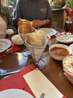 Garlic Naan with three different vegan curries, super tasty!  at Imlee in Bochum
