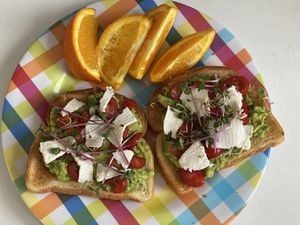 Avo toast with chive goat cheeze  and micro greens.  at Vromage Dairy-Free Cheese Shop in West Hollywood