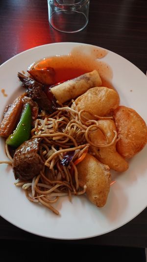Fried sweet potatoes, Fried vegan shrimp, fried vegan chicken, fried pinapple, noodles m.m at Vegegården in Malmo