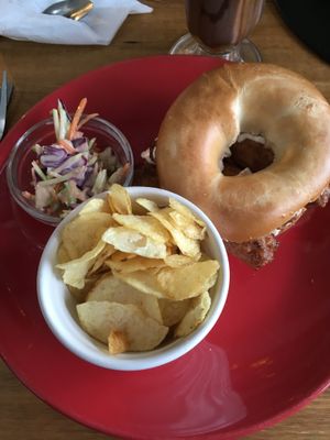 Vegan sausage and bacon bagel with coleslaw  at The Old Hardware Shop in Liverpool