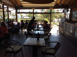 Out of the midday sun. Enjoy a cool drink or hot curry ?  at Ona Beach Bar in Roses