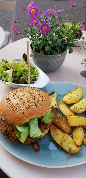 Yummy Lentil-Burger with potatoes + side salad (~14€) at Eugens Bio Cafe Restaurant in Konstanz