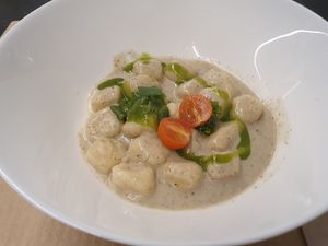 Ñoquis de patata con queso vegano de hierbas at Km.0 in San Sebastian