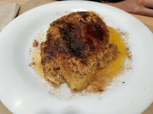 Torrija de pan de maíz con salsa de naranja at Km.0 in San Sebastian