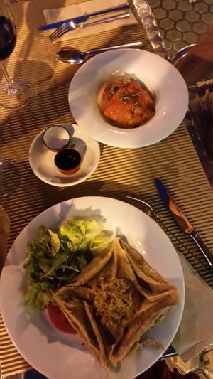 Here in the middle you can see the algas that we got for free and they were delicious!! Also the bread they serve is much better than in other Spanish restaurants. The big dish is a buckwheat patty with salad which was nice but the other thing is a starter (tomato and rice) and it was AMAZING! Also one of the best things me or my critical boyfriend have ever tasted. at Km.0 in San Sebastian