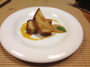 Bizkotxo cake with orange sauce  at Km.0 in San Sebastian