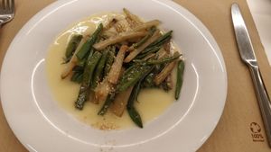 Sauted green beans and kale on potato cream at Km.0 in San Sebastian