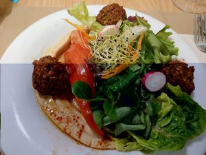 Ensalada de humus y falafel at Km.0 in San Sebastian
