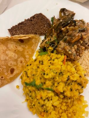 Main menu Dhall, and special Thai curry with bread.   at HōnestBar:Ibiza  in Ibiza