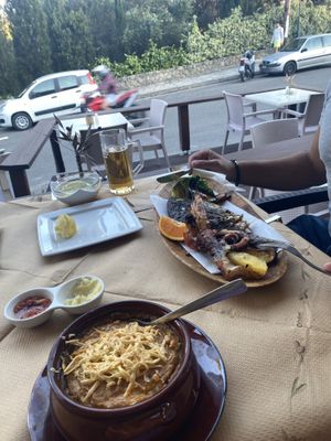 My vegan musaka (my husbands not vegan fish platter)  at Gran Aladino in Corfu