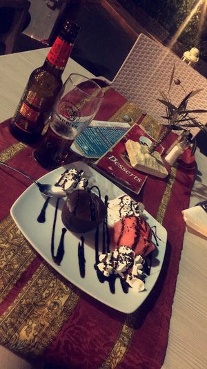 Vegan chocolate cake and strawberry Ice cream at Gran Aladino in Corfu