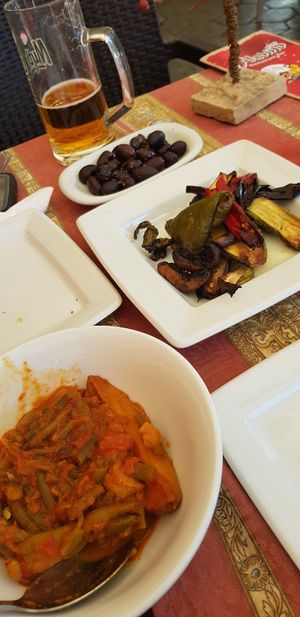 green beans in tomato sauce, olives and roasted veggies at Gran Aladino in Corfu
