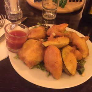 appetizer dripping oil at Brasserie LoLa in Paris