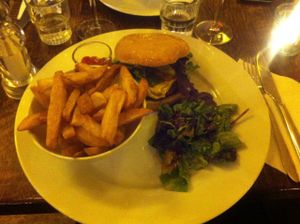 Vegan burger with cheese at Brasserie LoLa in Paris