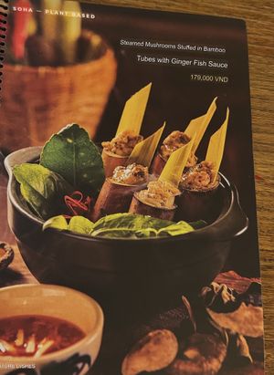 Translation in English -Steamed Mushrooms Stuffed in Bamboo
Tubes with Ginger Fish Sauce  at Soha plant-based Tea & Coffee in Ho Chi Minh