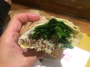 Wrap with hummus, spinach, quinoa, and sun-dried tomatoes. Tasty.  at Shake Cafe - Santa Maria Novella in Florence