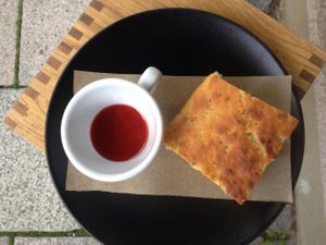 Home made focaccia w/ strawberry jam  at Little Kind Cafe in Munich