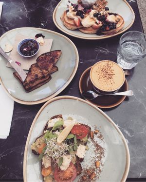 Pancakes, Avo on toast, fruit toast and a golden turmeric latte. at Nurcha Maroochydore in Buderim