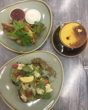 Wedges, smashed avo & golden turmeric latte at Nurcha Maroochydore in Buderim