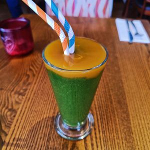 Mango Tango Juice 🧡💚🥭🌱 at Karmana 100% Plant Based in Northampton