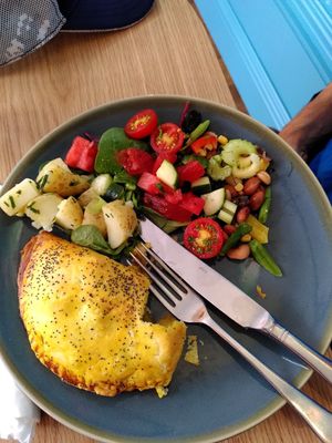 Pasty (with a small bite taken) and salad at Mudlarks Garden Cafe in Hertford
