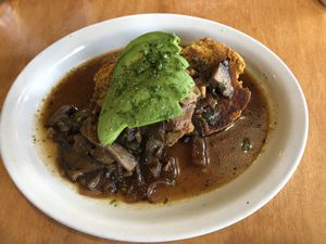 Sweet potato biscuit with mushroom gravy and avocado- must try!! at The Post in Nashville
